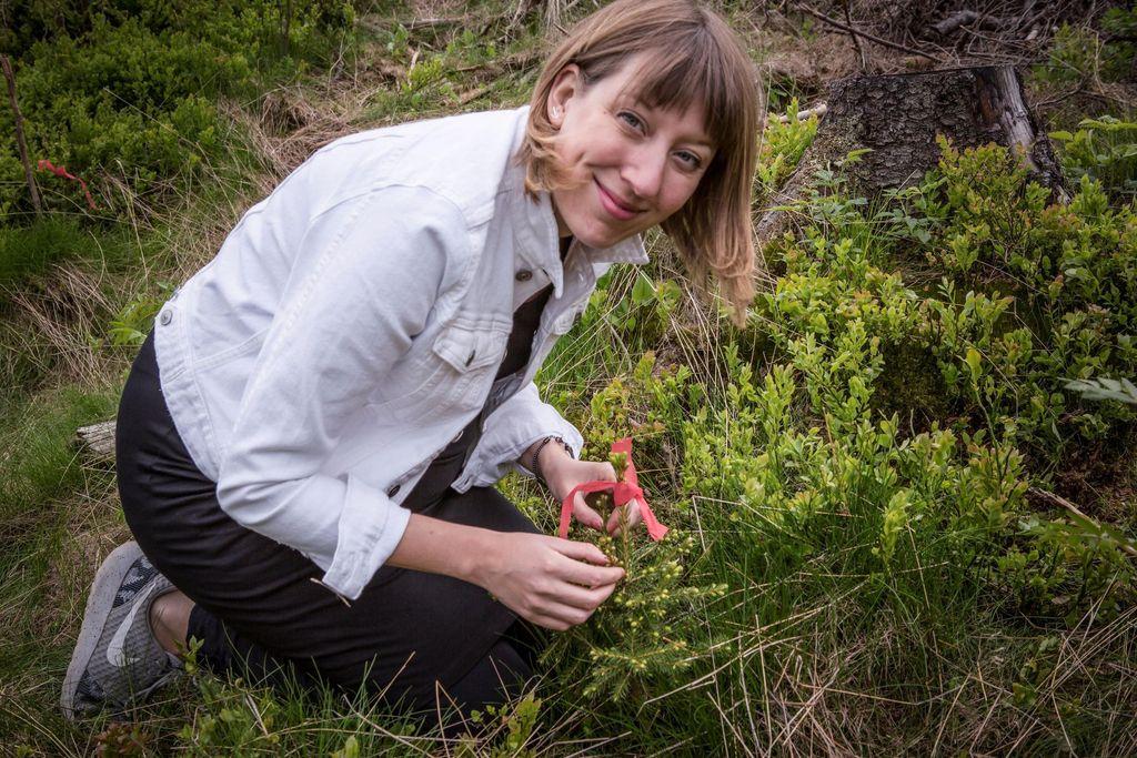 Katie Paterson with one of the newly planted trees in 2017