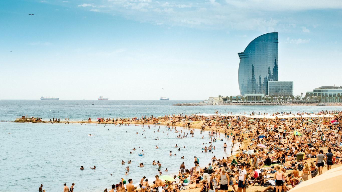 Crowded beach in Barcelona.