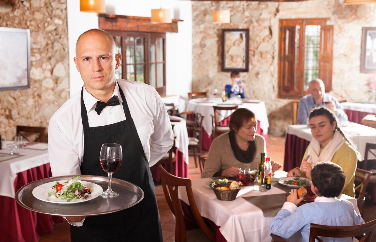 Various positions are offered, from waiter to kitchen assistant.