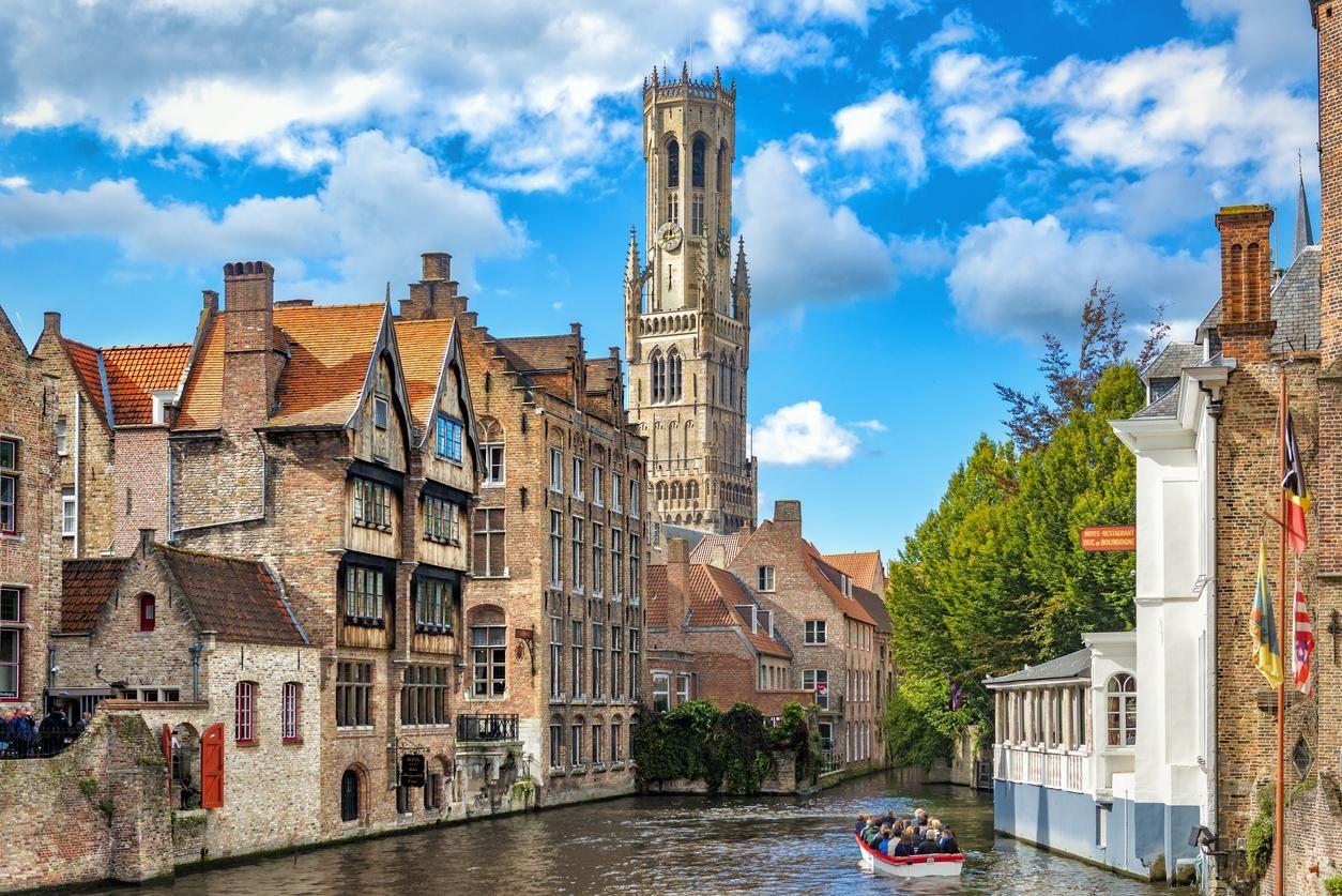 A canal in Bruges with views of Rozenhoedkaai