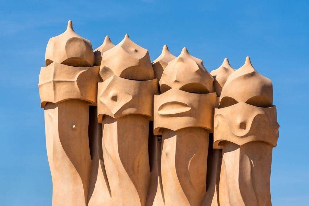 Faces of warriors on the ventilation towers of Casa Milà, Barcelona.